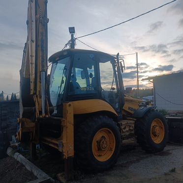 Экскаватор-погрузчик Komatsu WB93S-5E0, 2011